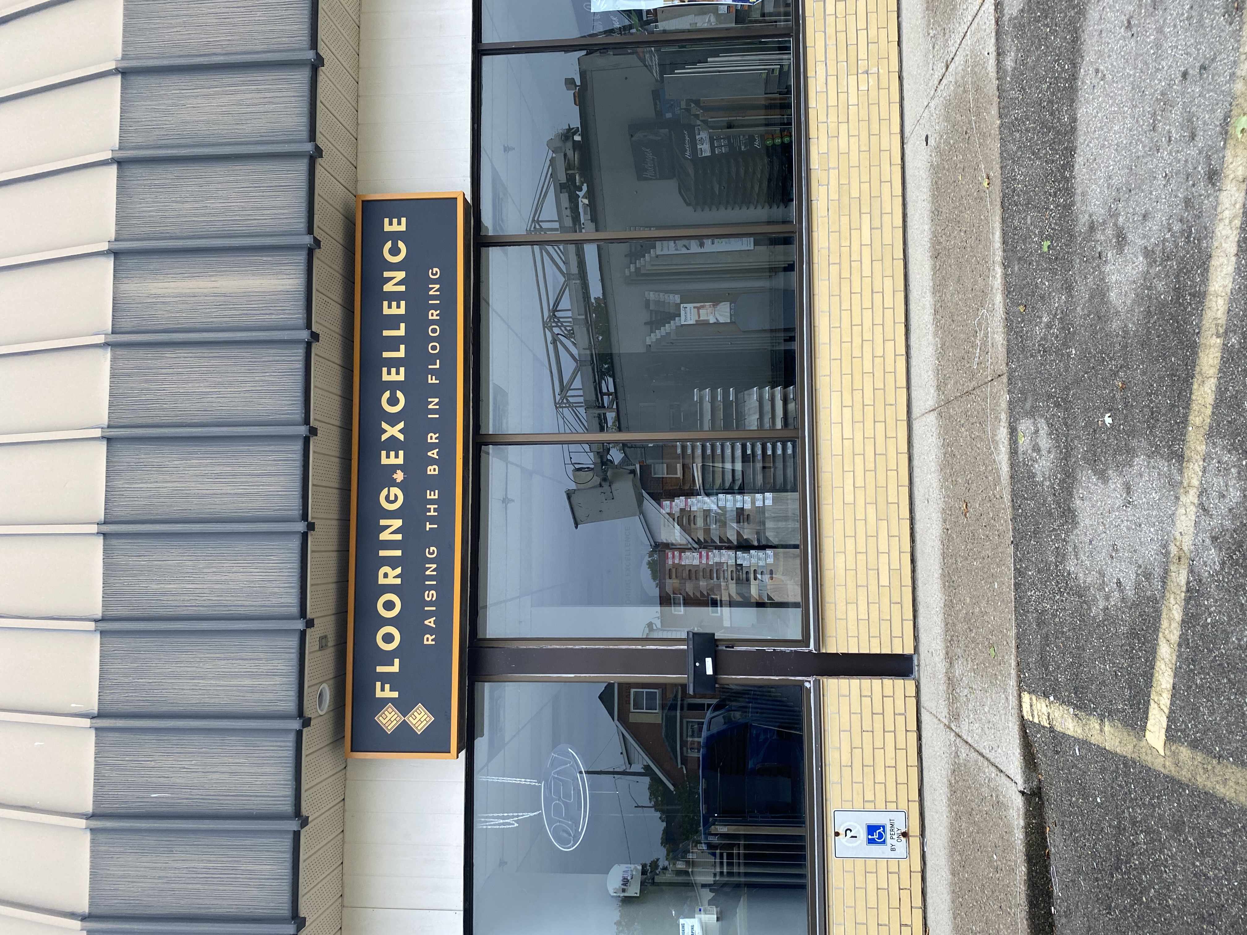 Flooring Excellence projecting blade sign