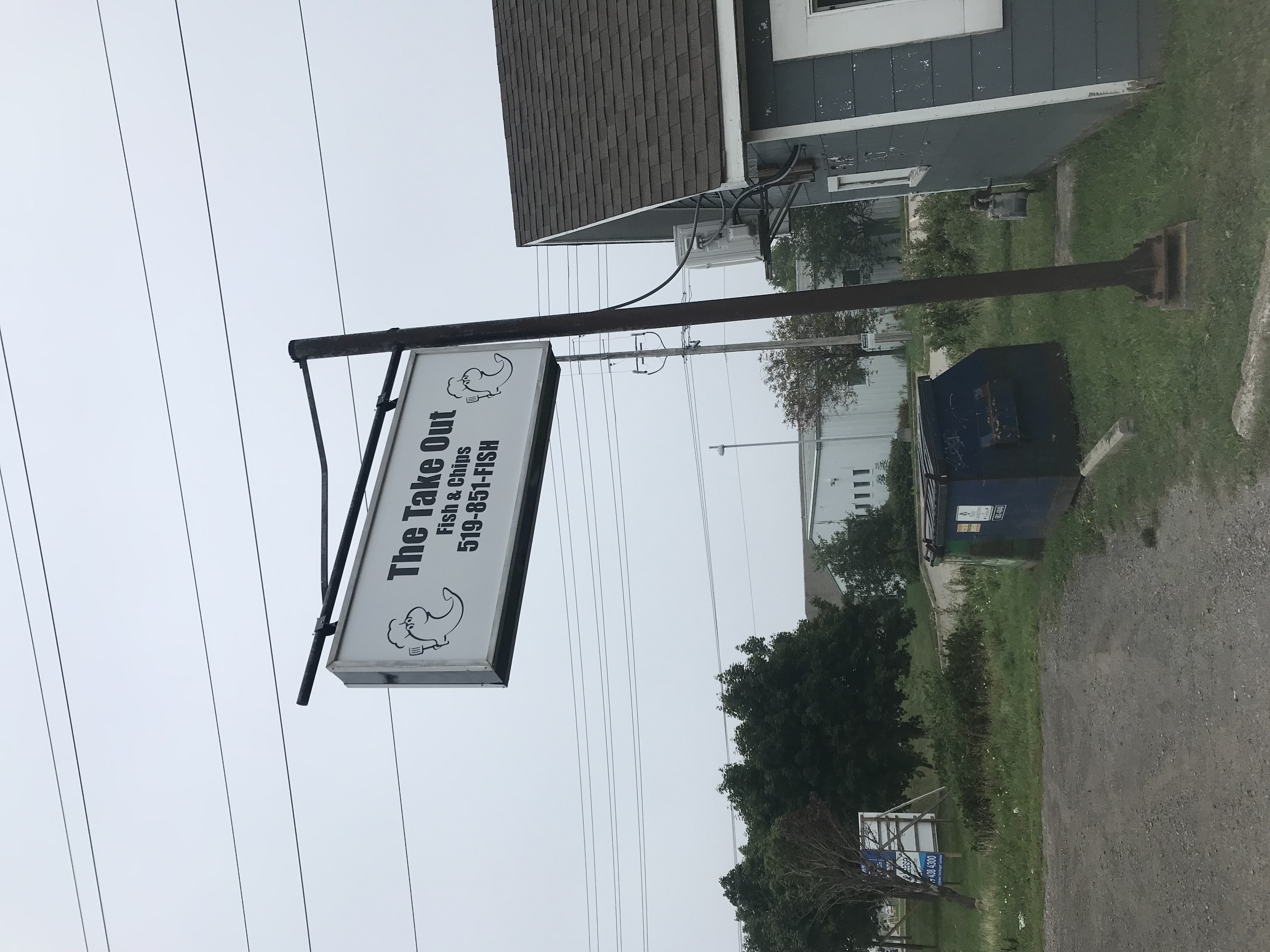 The Take Out Fish & Chips lit lollipop sign